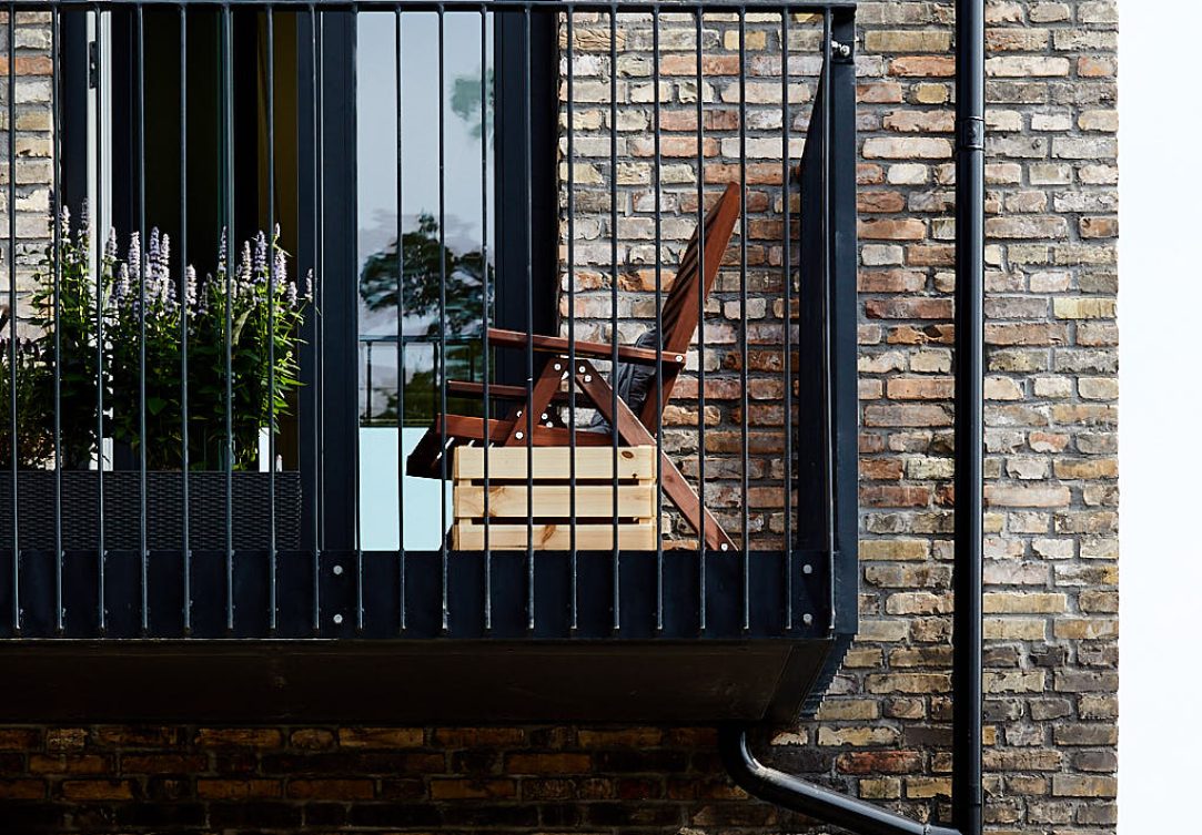 Historien bevaret og videreført ved hjælp af gule patinerede mursten, oprindeligt fra det ikoniske Søndermarkshus fra 1878.